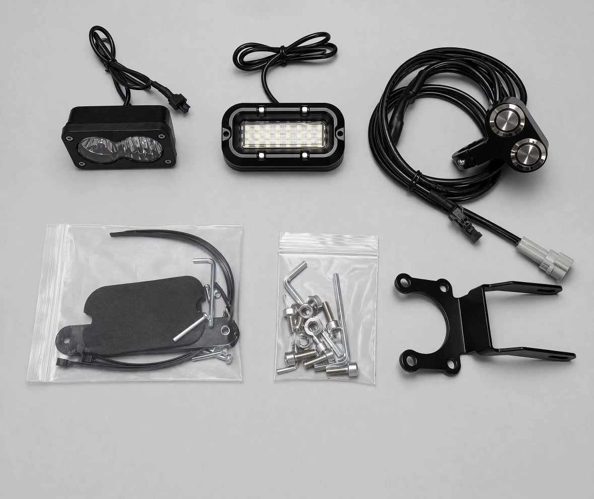 Surron Lbx plug and play rock light and front fake Baja